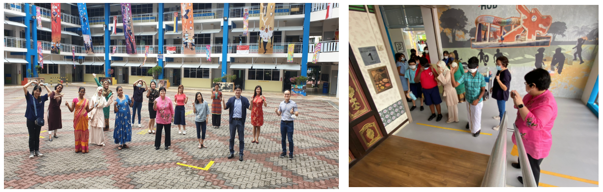 Group of people posing in a school courtyard; another group viewing a wall display indoors.